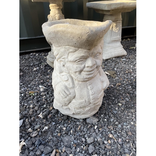 268 - A concrete toby figure planter