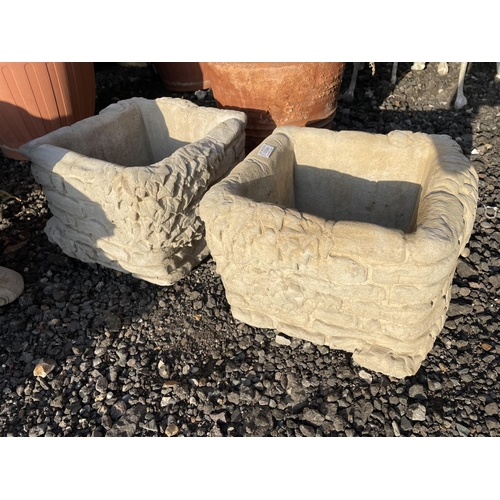 269 - A pair of brick effect square planters