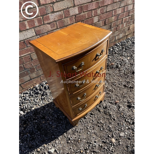 10 - A small yew wood reproduction chest of four drawers