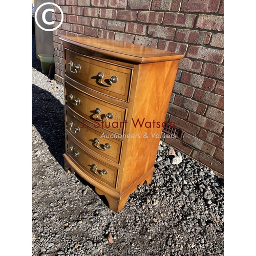 10 - A small yew wood reproduction chest of four drawers