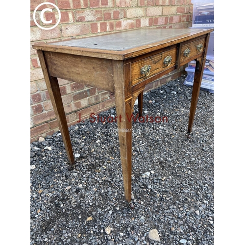 105 - A Victorian rosewood two drawer writing table with a blue leather top