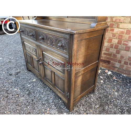 107 - A 20th century oak dresser by Jaycee