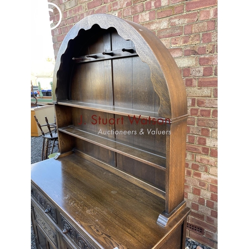 107 - A 20th century oak dresser by Jaycee