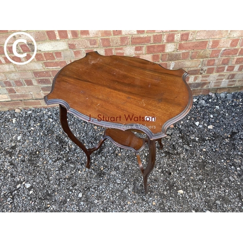 121 - A mahogany occasional table