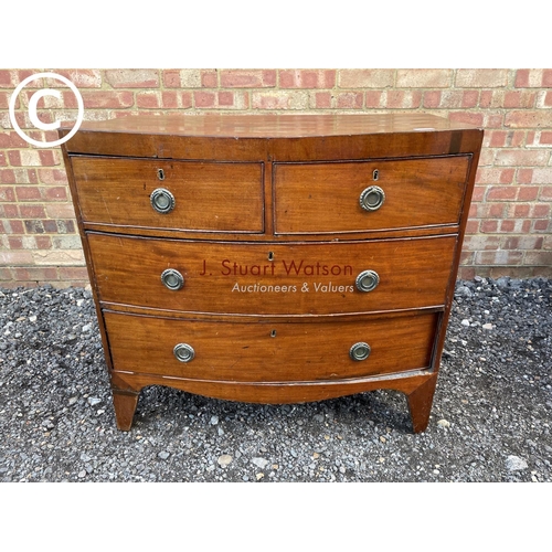 122 - A Victorian mahogany bow front chest of four drawers