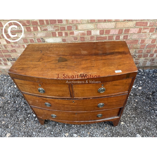 122 - A Victorian mahogany bow front chest of four drawers