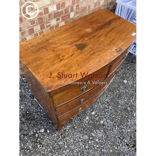 122 - A Victorian mahogany bow front chest of four drawers