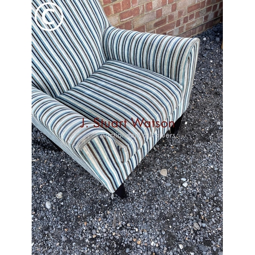 137 - A modern striped armchair from next