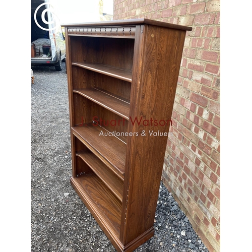 161 - An Ercol golden dawn open fronted bookcase