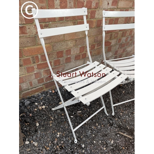 171 - A pair of metal folding chairs