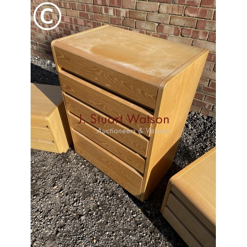 179 - A modern Danish bedroom suite consisting of a tallboy chest and two bedsides