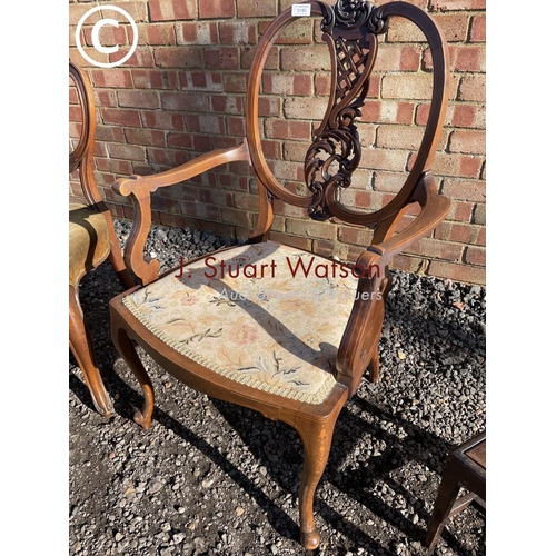 180 - A Victorian mahognay carver chair together with a balloon back chair and a child's chair