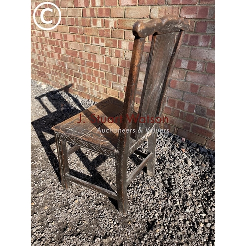 182 - An 18th century dutch carved oak chair