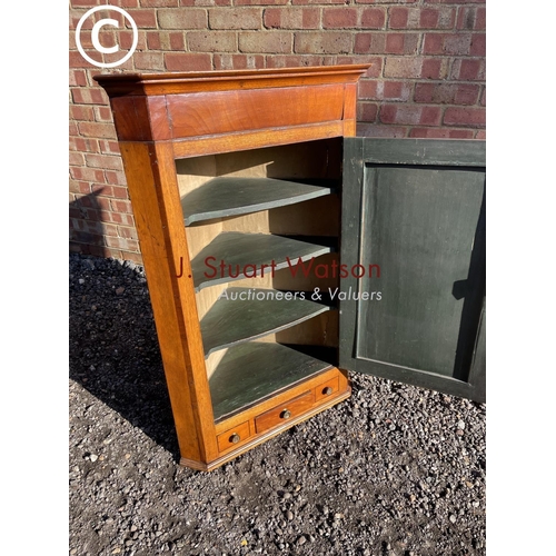 183 - An antique oak wall hanging corner corner cupboard with a painted interior