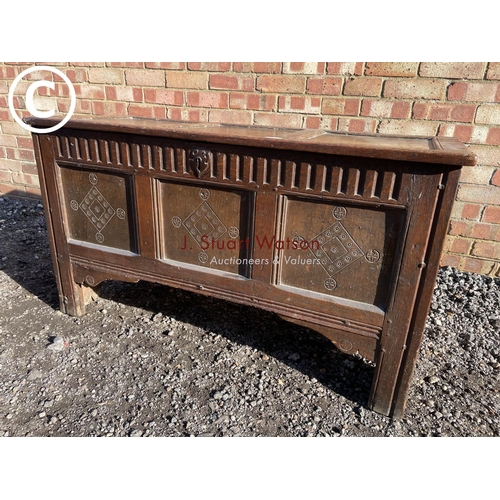 187 - An 17th century oak three panel blanket coffer