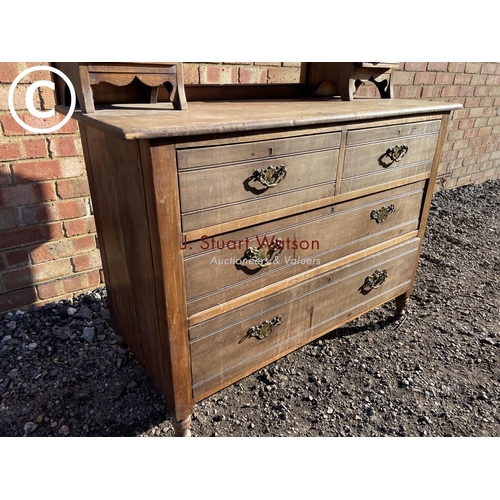 189 - A satinwood dressing chest of four drawers