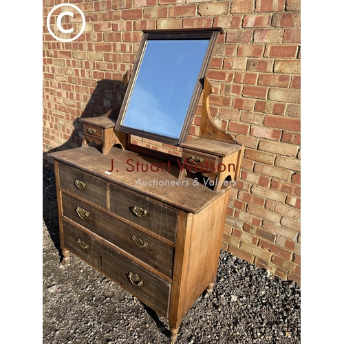 189 - A satinwood dressing chest of four drawers