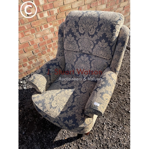 191 - A blue and gold pattern fireside chair