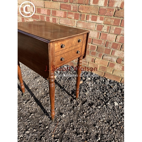 194 - A Victorian mahogany drop leaf work table with two drawers and two dummy drawers