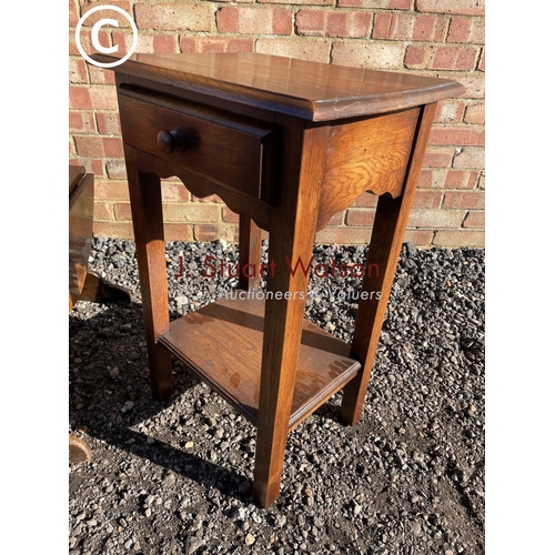 198 - A carved piano stool together with a drop leaf oak table and a single drawer oak side table