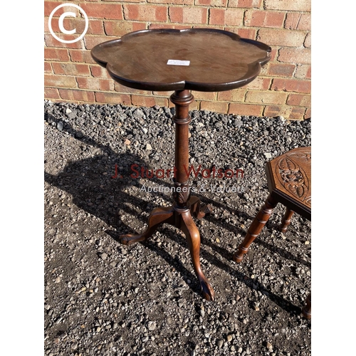 199 - A carved spinning chair together with a mahogany tripod occasional table