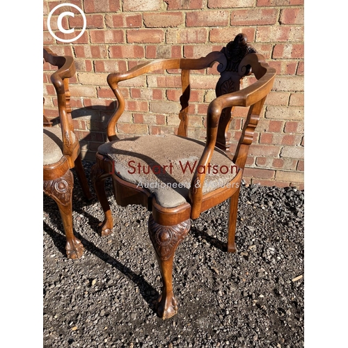 201 - A pair of French style ornate mahogany  elbow chairs with ball and claw feet