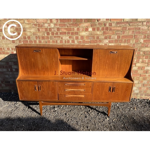 215 - A g Plan fresco teak high back cocktail sideboard with drop down front