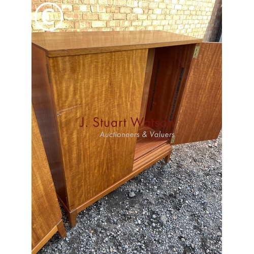 218 - A pair of mid century teak office cupboards, one having a glazed bookcase top