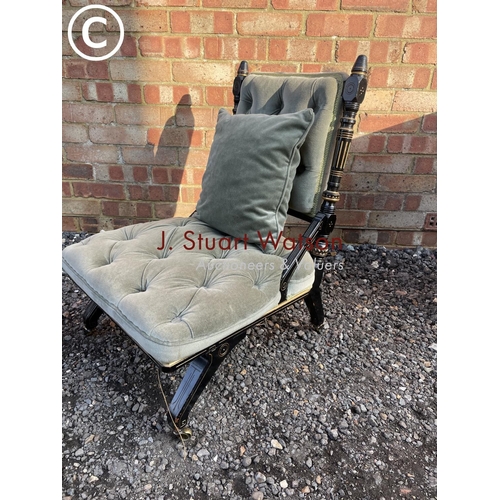 224 - A green upholstered ebonised salon chair