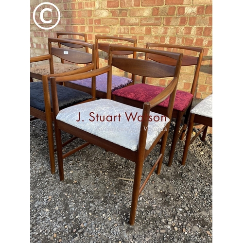 231 - A set of six Macintosh teak dining chairs including 2 carvers with crush velvet upholstered seats