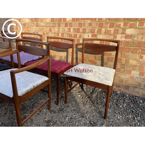 231 - A set of six Macintosh teak dining chairs including 2 carvers with crush velvet upholstered seats