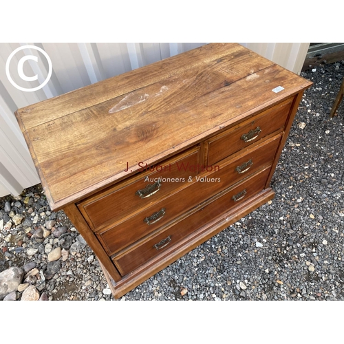 243 - An Edwardian satinwood chest of four drawers