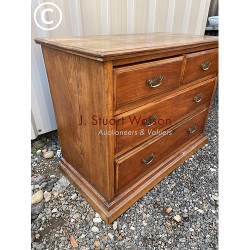 243 - An Edwardian satinwood chest of four drawers