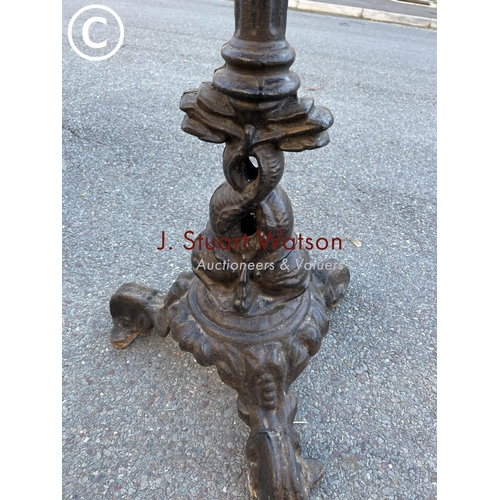 25 - An antique case iron ornate table base