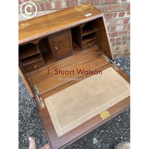 273 - A 20th century walnut bureau