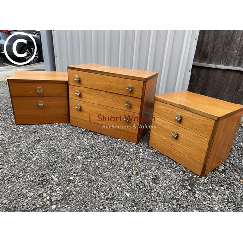 282 - A stag teak three piece bedroom suite consisting of a chest of three and pair bedsides