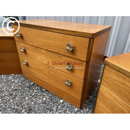 282 - A stag teak three piece bedroom suite consisting of a chest of three and pair bedsides