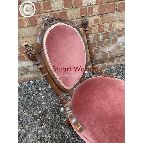 284 - A Victorian pink upholstered salon chair