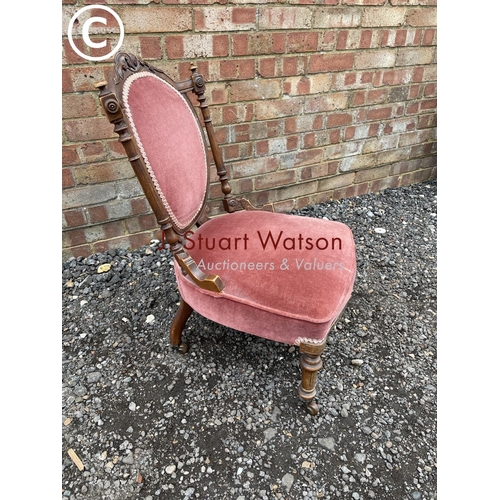 284 - A Victorian pink upholstered salon chair