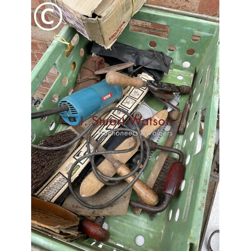 293 - An assortment of tools, including stillsons, saw, grinder and more - contained in two crates and a b... 