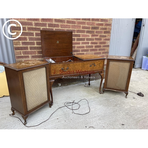 295 - A walnut cased dynatron record player with garrard deck, together with speakers