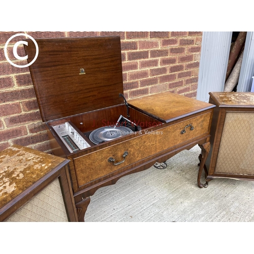 295 - A walnut cased dynatron record player with garrard deck, together with speakers