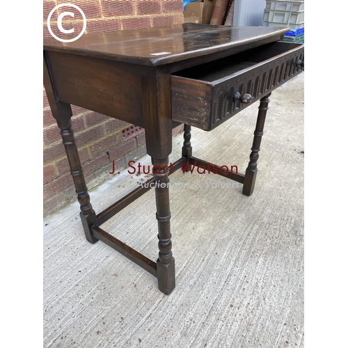 299 - A small reproduction oak single drawer table