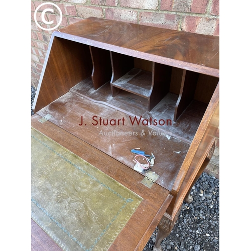 3 - A reproduction mahogany writing bureau