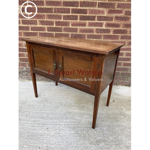 302 - An Edwardian mahogany washstand cupboard