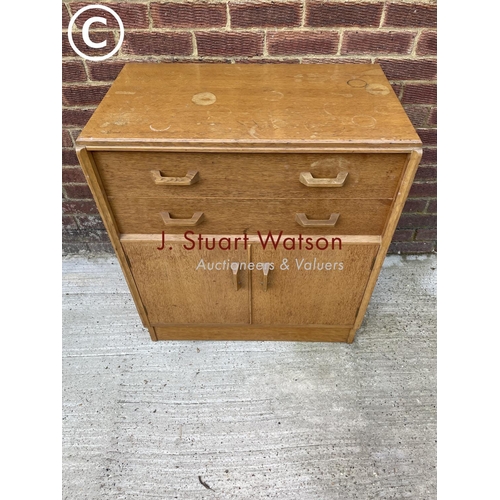 306 - A G plan  light oak chest of two