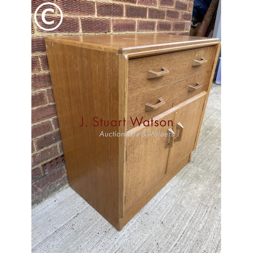 306 - A G plan  light oak chest of two