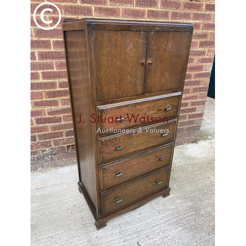 310 - A early 20th century oak tallboy