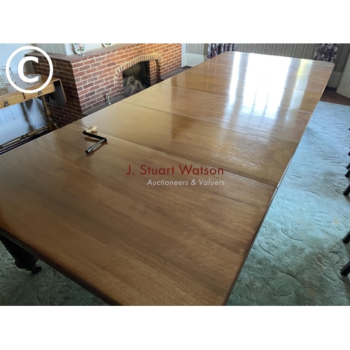 313 - A very large victorian mahogany wind out dining table with four extension leaves 

356 cm long 
136c... 