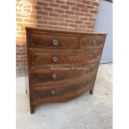 317 - A Victorian mahogany bow front chest of five drawers